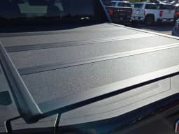 GMC Sierra EV Extended Range Elevation e4WD Crew Cab 2026 — side view