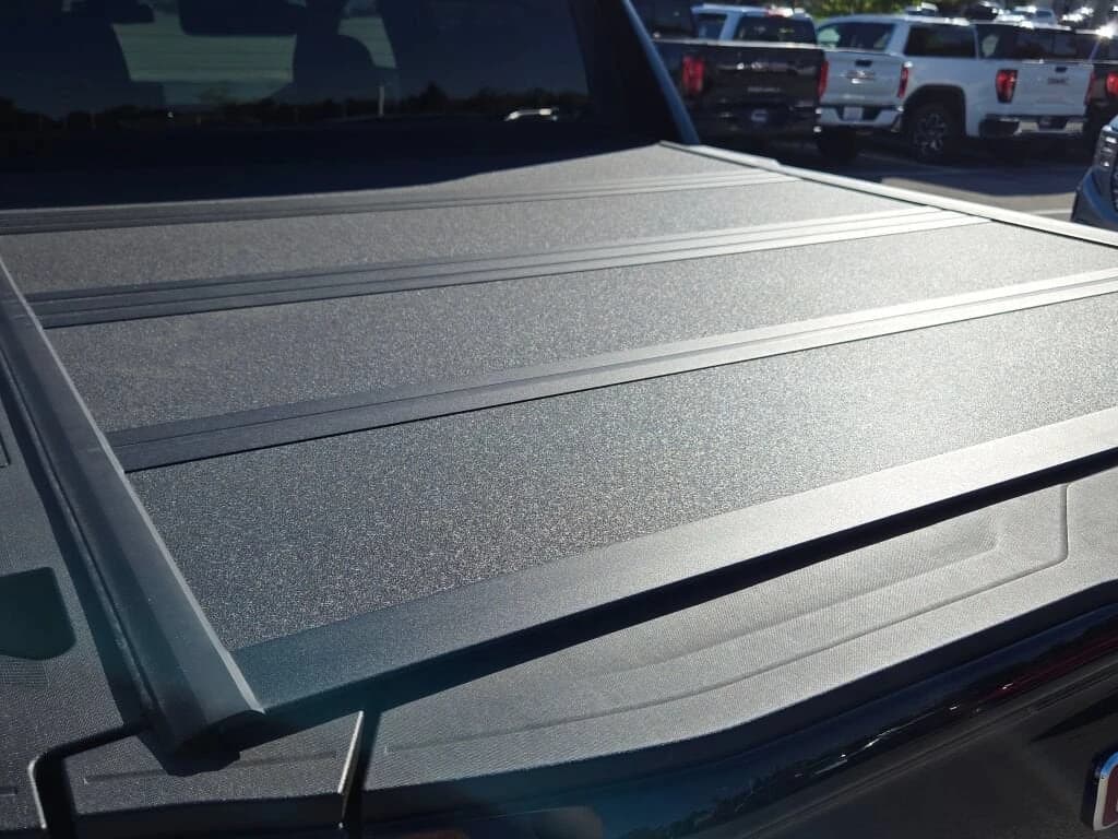 GMC Sierra EV Extended Range Elevation e4WD Crew Cab 2026 — side view