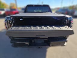 GMC Sierra EV Extended Range Elevation e4WD Crew Cab 2026 — side view
