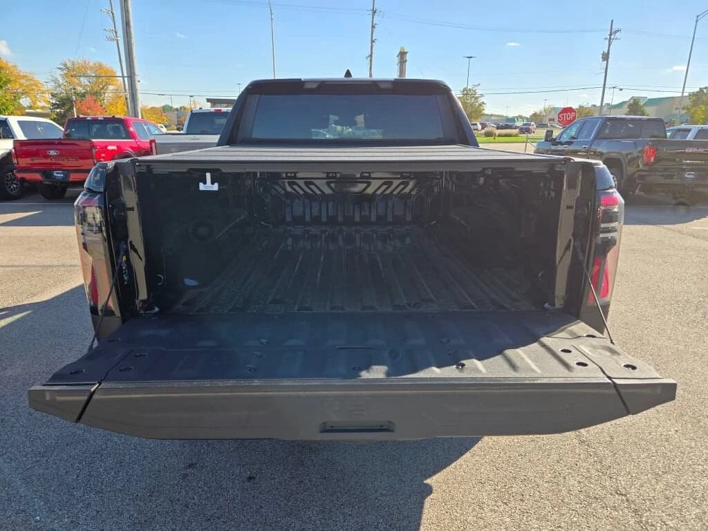 GMC Sierra EV Extended Range Elevation e4WD Crew Cab 2026 — side view