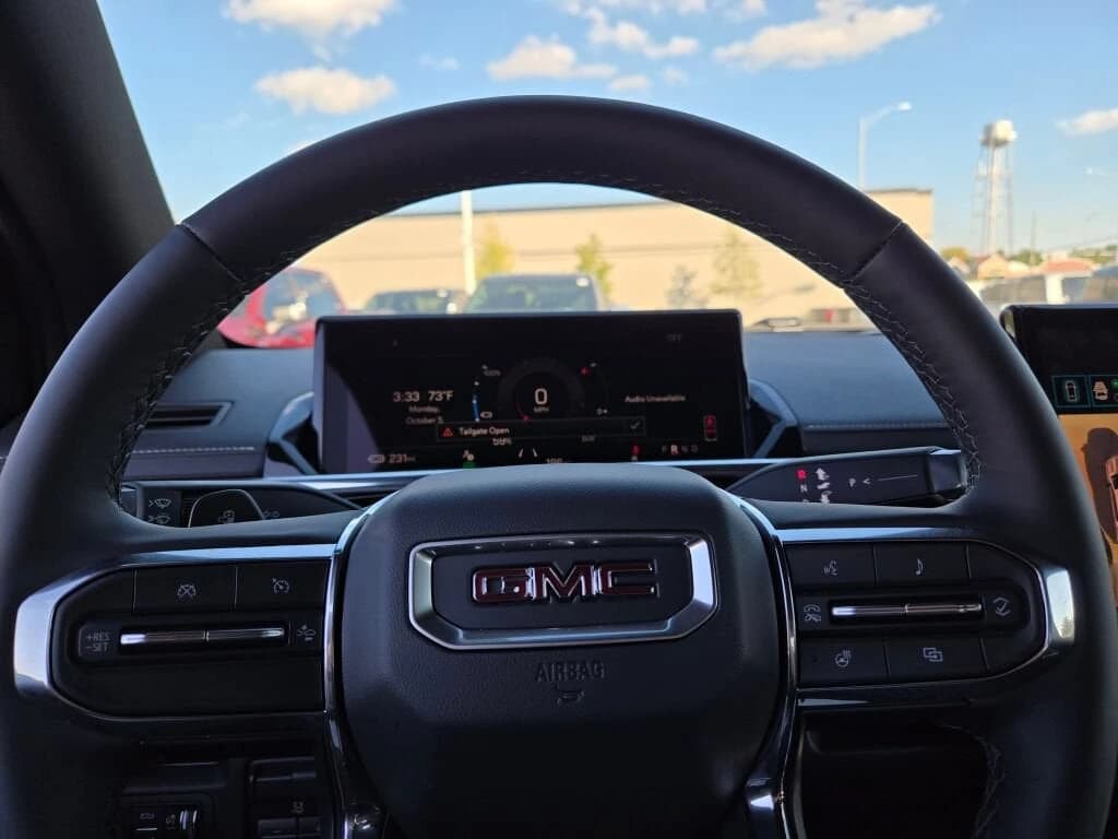 GMC Sierra EV Extended Range Elevation e4WD Crew Cab 2026 — side view