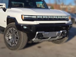 GMC HUMMER EV Pickup 3X e4WD Crew Cab 2025 — side view