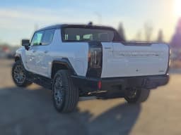 GMC HUMMER EV Pickup 3X e4WD Crew Cab 2025 — side view
