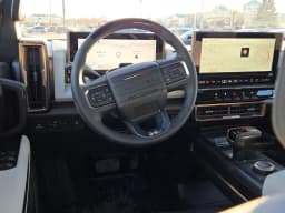 GMC HUMMER EV Pickup 3X e4WD Crew Cab 2025 — side view