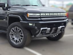 GMC HUMMER EV Pickup 3X e4WD Crew Cab 2025 — side view