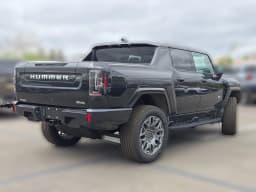 GMC HUMMER EV Pickup 3X e4WD Crew Cab 2025 — side view
