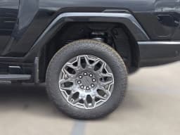 GMC HUMMER EV Pickup 3X e4WD Crew Cab 2025 — side view