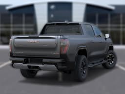 GMC Sierra EV Max Range AT4 e4WD Crew Cab 2026 — side view