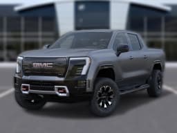 GMC Sierra EV Max Range AT4 e4WD Crew Cab 2026 — side view