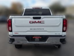 GMC Sierra 2500HD SLE 4WD Crew Cab 159" 2026 — side view
