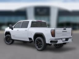 GMC Sierra 2500HD AT4 4WD Crew Cab 159" 2026 — side view