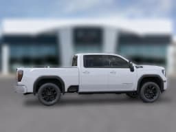 GMC Sierra 2500HD AT4 4WD Crew Cab 159" 2026 — side view