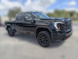 GMC Sierra 2500HD AT4 4WD Crew Cab 159" 2026 — side view