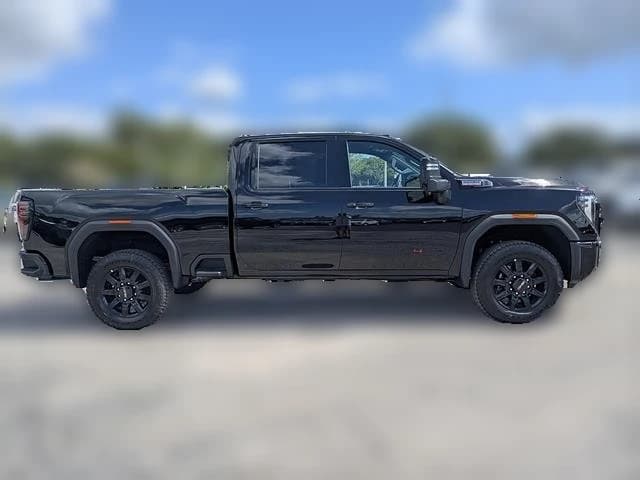 GMC Sierra 2500HD AT4 4WD Crew Cab 159" 2026 — side view