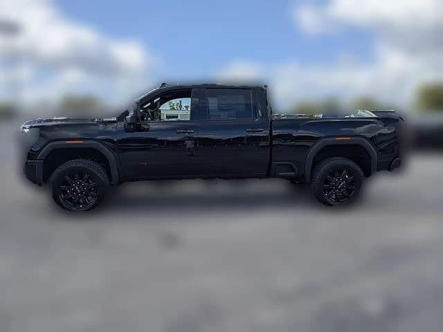 GMC Sierra 2500HD AT4 4WD Crew Cab 159" 2026 — side view