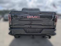 GMC Sierra 2500HD AT4 4WD Crew Cab 159" 2026 — side view
