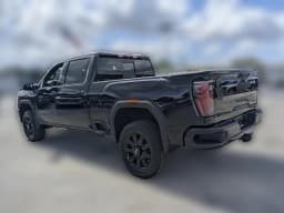 GMC Sierra 2500HD AT4 4WD Crew Cab 159" 2026 — side view