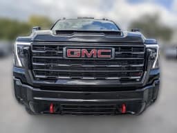 GMC Sierra 2500HD AT4 4WD Crew Cab 159" 2026 — side view