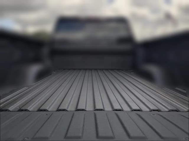 GMC Sierra 2500HD AT4 4WD Crew Cab 159" 2026 — side view
