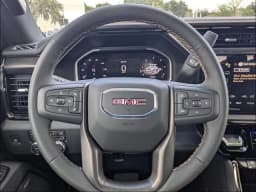 GMC Sierra 2500HD AT4 4WD Crew Cab 159" 2026 — side view