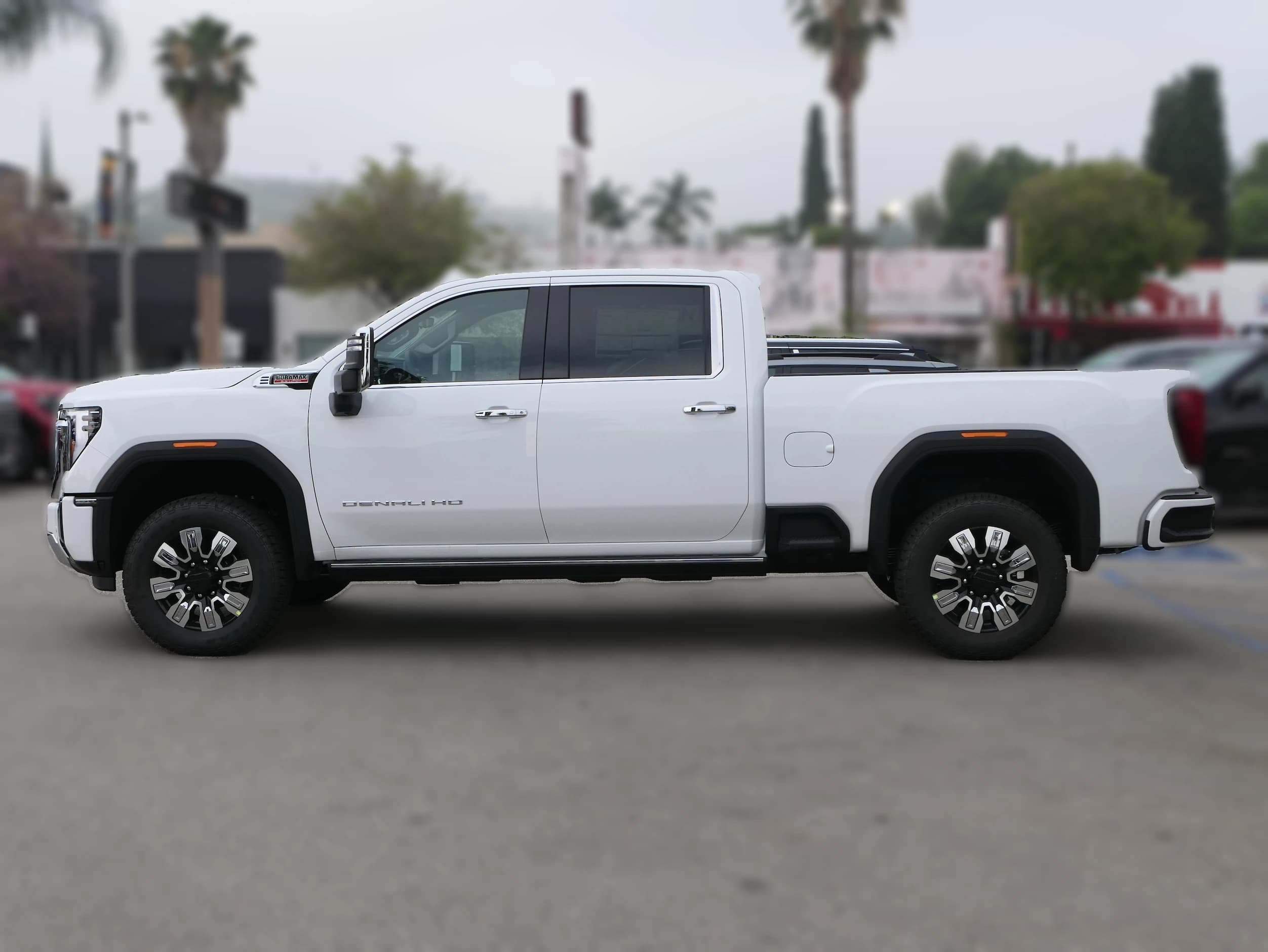 GMC Sierra 2500HD Denali 4WD Crew Cab 159" 2026 — side view