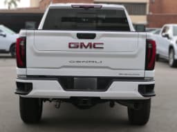GMC Sierra 2500HD Denali 4WD Crew Cab 159" 2026 — side view