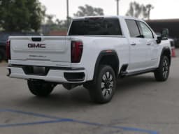 GMC Sierra 2500HD Denali 4WD Crew Cab 159" 2026 — side view