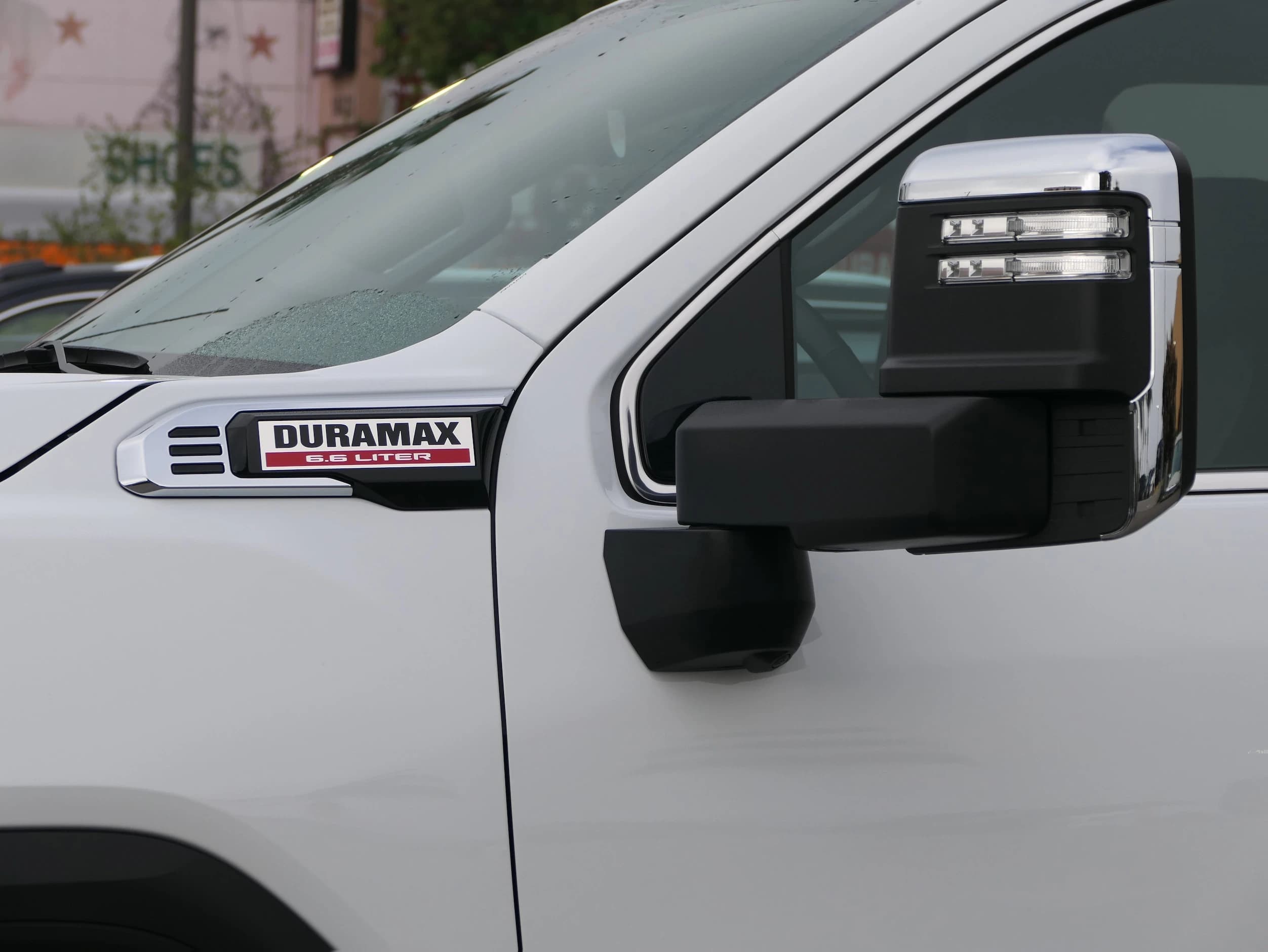 GMC Sierra 2500HD Denali 4WD Crew Cab 159" 2026 — side view