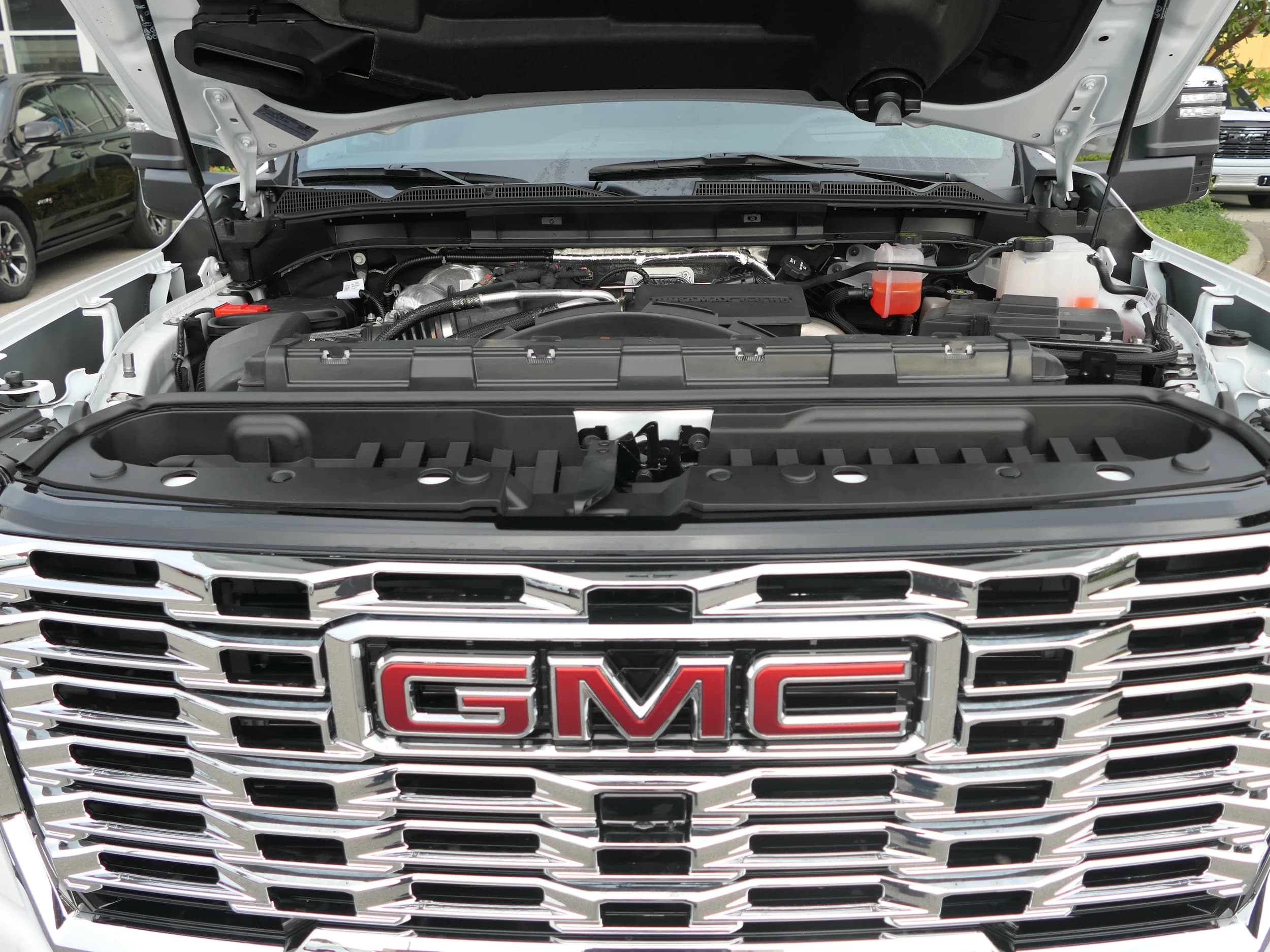 GMC Sierra 2500HD Denali 4WD Crew Cab 159" 2026 — side view