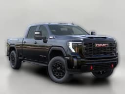 GMC Sierra 3500HD AT4 4WD Crew Cab 159" 2026 — side view