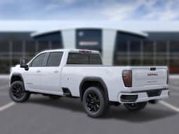 GMC Sierra 3500HD AT4 4WD Crew Cab 172" 2026 — side view