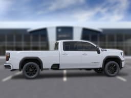 GMC Sierra 3500HD AT4 4WD Crew Cab 172" 2026 — side view