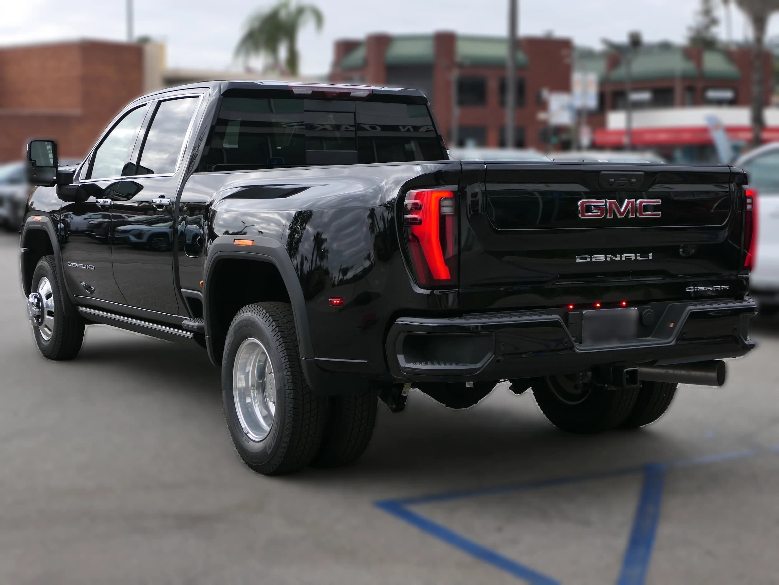 GMC Sierra 3500HD Denali 4WD Crew Cab 159" 2026 — side view