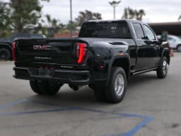 GMC Sierra 3500HD Denali 4WD Crew Cab 159" 2026 — side view