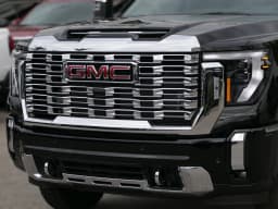 GMC Sierra 3500HD Denali 4WD Crew Cab 159" 2026 — side view