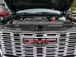 GMC Sierra 3500HD Denali 4WD Crew Cab 159" 2026 — side view