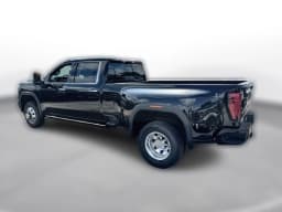 GMC Sierra 3500HD Denali Ultimate 4WD Crew Cab 159" 2026 — side view