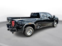 GMC Sierra 3500HD Denali Ultimate 4WD Crew Cab 159" 2026 — side view