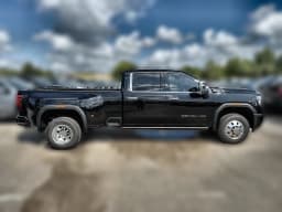 GMC Sierra 3500HD Denali Ultimate 4WD Crew Cab 159" 2026 — side view