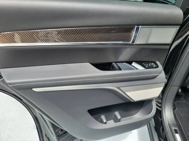 Cadillac VISTIQ Luxury AWD 4dr 2027 — side view
