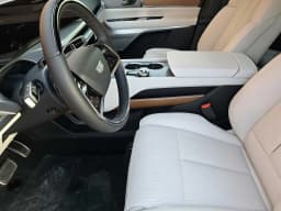 Cadillac VISTIQ Luxury AWD 4dr 2027 — side view