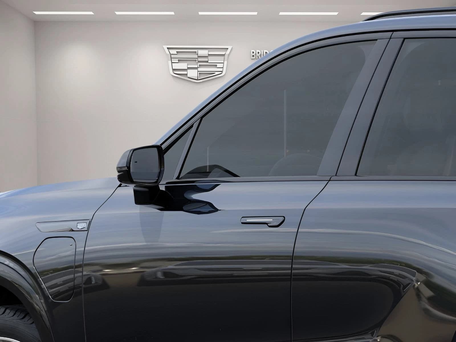 Cadillac VISTIQ Sport AWD 4dr 2027 — side view