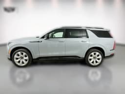 Cadillac Escalade IQL Premium Sport AWD 4dr 2026 — side view
