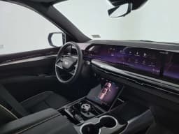 Cadillac Escalade 2WD Luxury 4dr 2027 — side view
