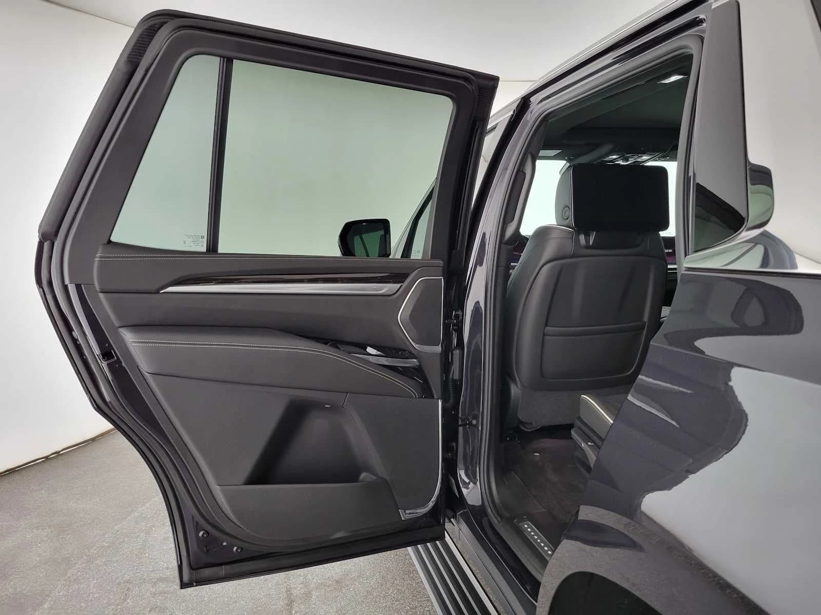 Cadillac Escalade 2WD Luxury 4dr 2027 — side view