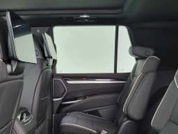 Cadillac Escalade 2WD Luxury 4dr 2027 — side view