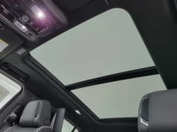 Cadillac Escalade 2WD Luxury 4dr 2027 — side view
