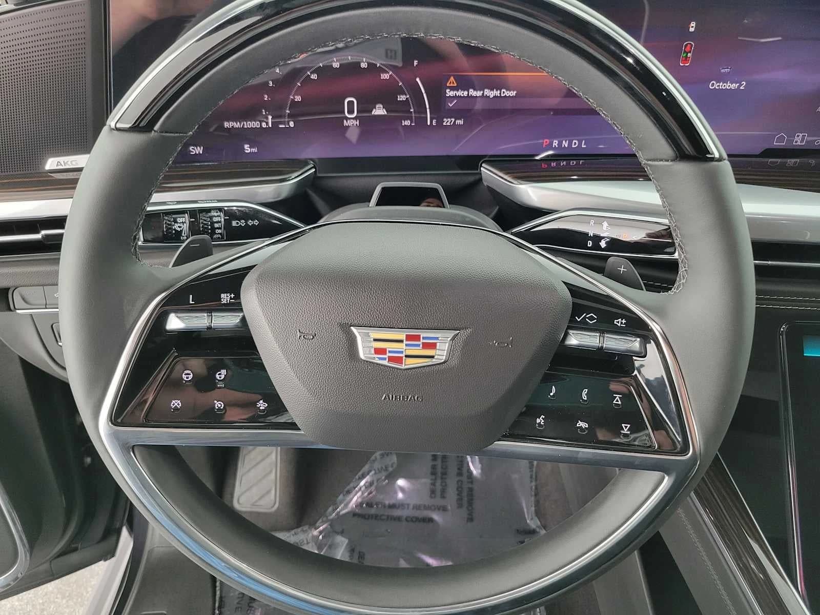Cadillac Escalade 2WD Luxury 4dr 2027 — side view