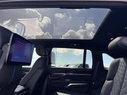 Cadillac Escalade IQ Luxury AWD 4dr 2026 — side view