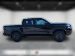 Nissan Frontier PRO-4X Crew Cab 4x4 2027 — side view